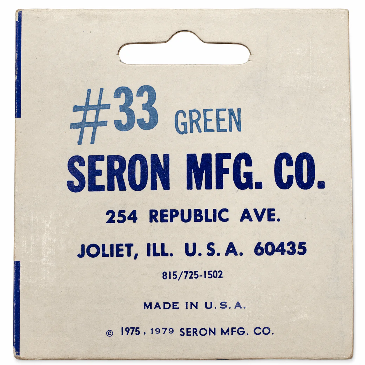 Back of an original Model P-38 Item 33 green whistle retail card with Seron Mfg. Co. address